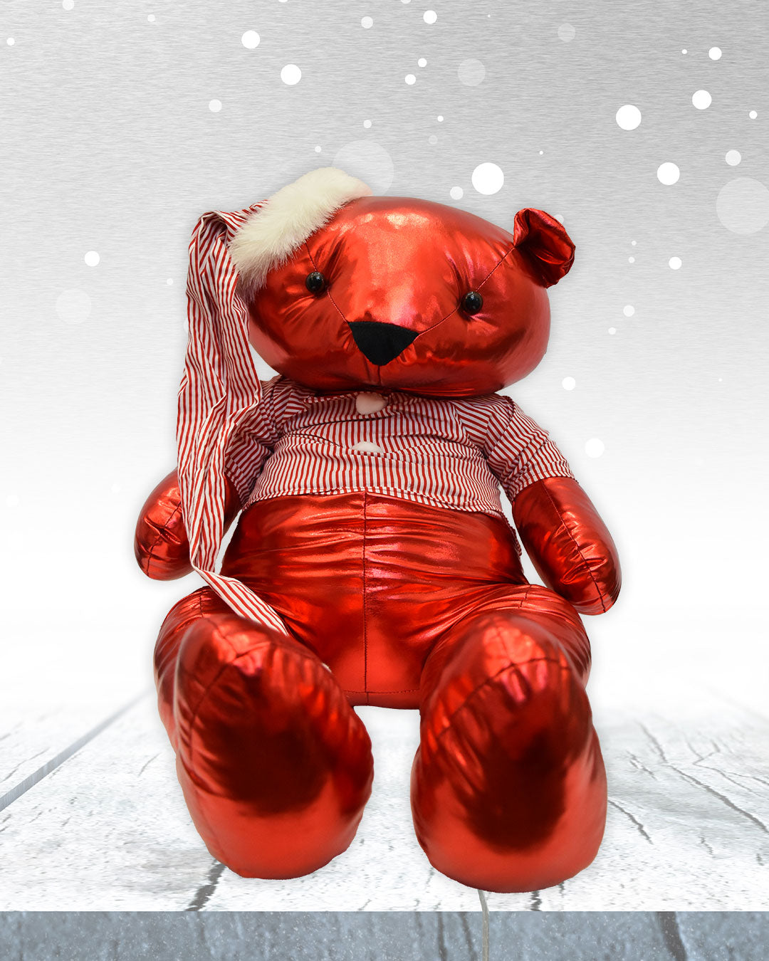 Oso rojo con pijama a rayas